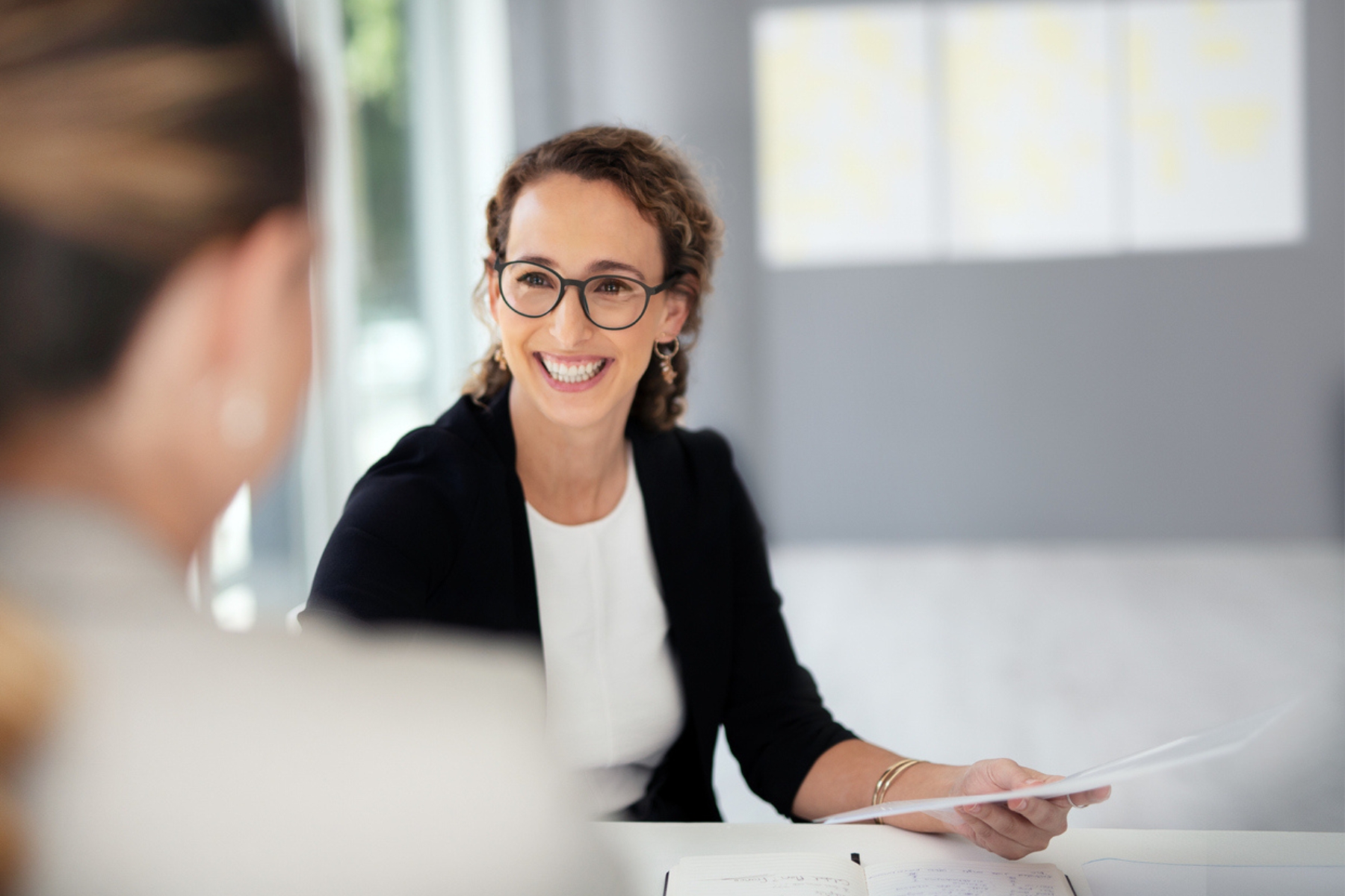 OSI MAy 2025 sponsored post featured image woman in office setting